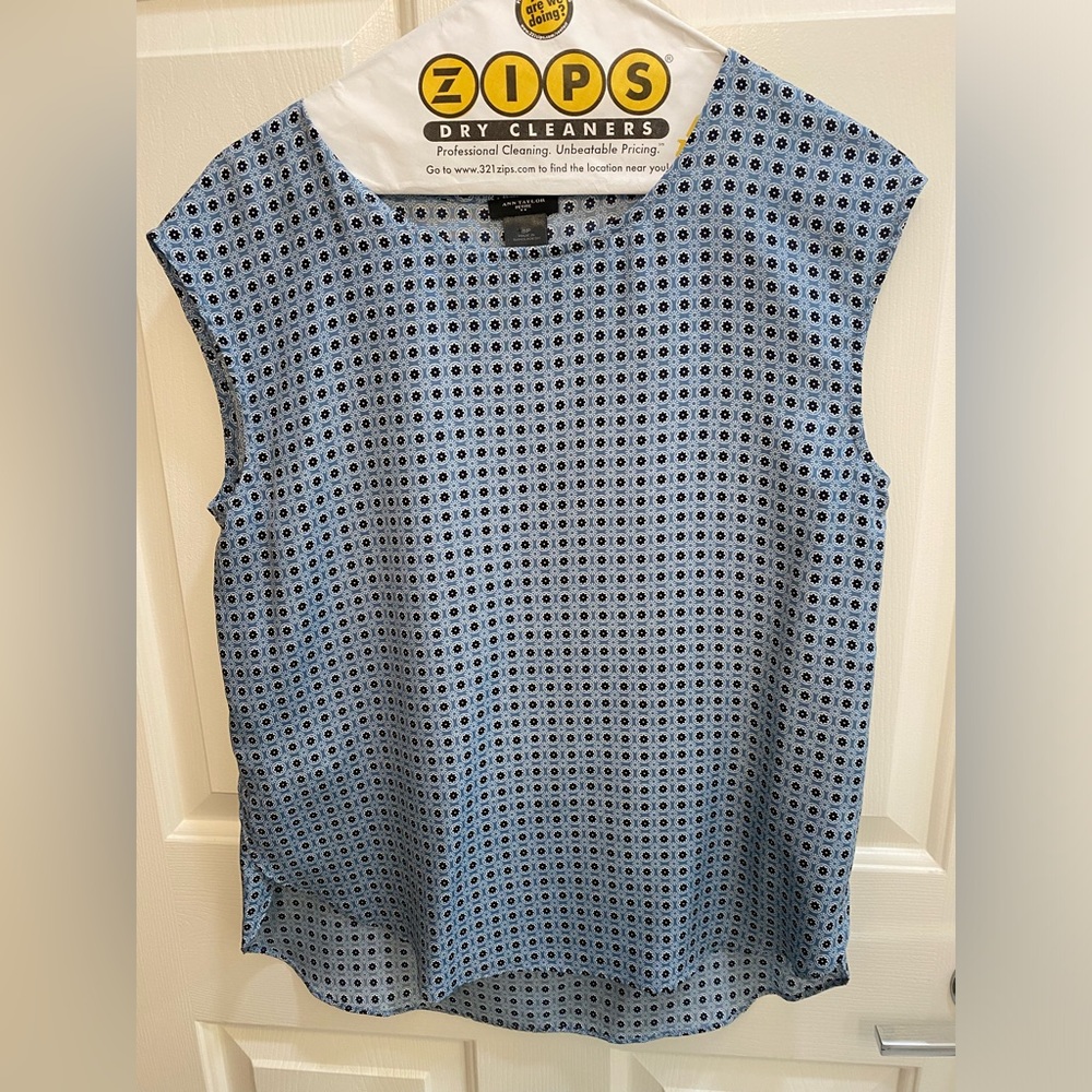 Ann Taylor blouse. Blue with repeating floral print. Size small, petite.
